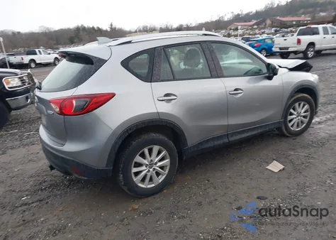 2014 Mazda Cx-5 Sport z USA, uszkodzony, nr VIN JM3KE2BEXE0311819
